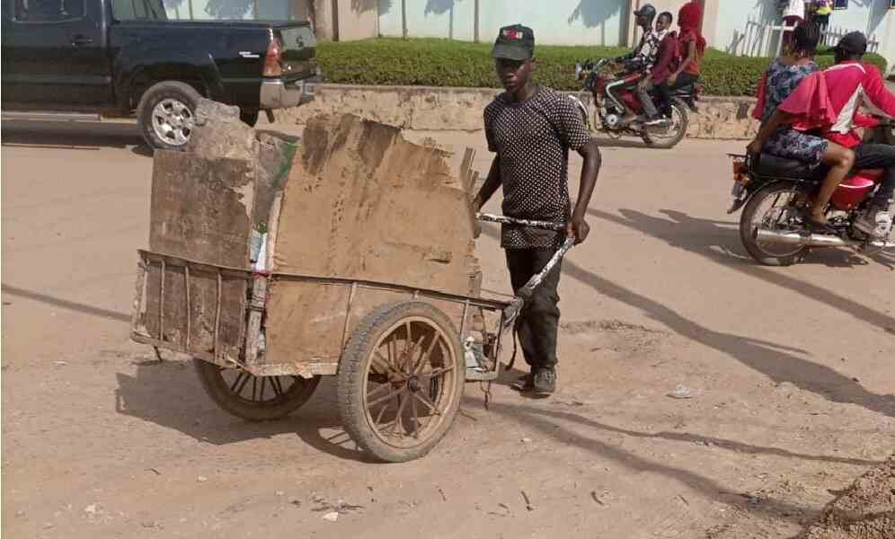 Scavengers commonly called 'Baban bola' can be seen ravaging the streets of major cities