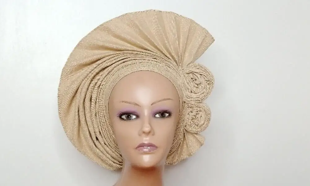 The double twisted gele is an easy gele style for wide foreheads